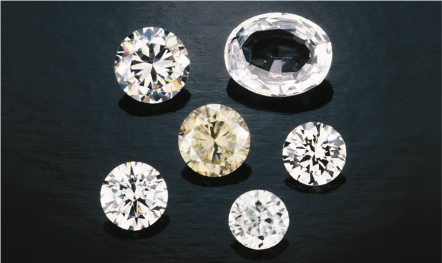 Diamond simulants, from top (left to right): Strontium titanate, synthetic spinel, synthetic rutile, yttrium aluminum garnet (YAG), zirconium oxide (CZ), zircon.